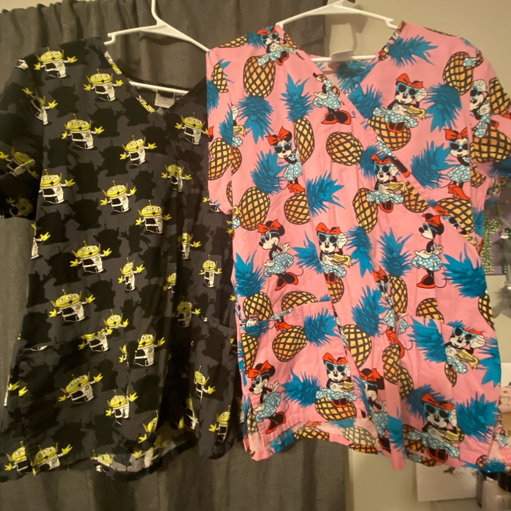 2 DISNEY scrub tops in size Large.